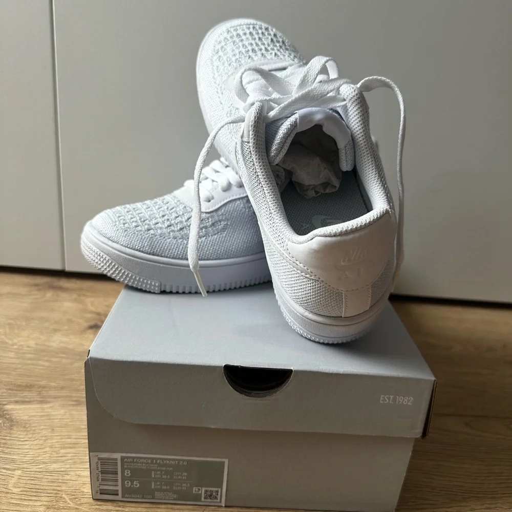 Nike Women’s Flyknit Low-Top Sneakers - White